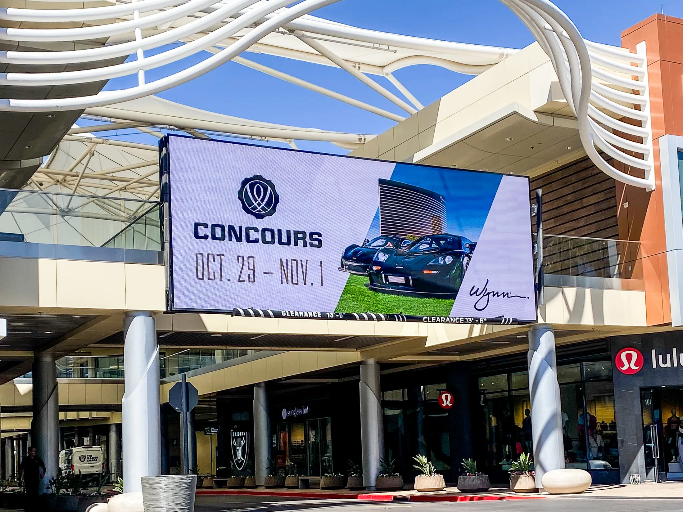 Wynn Concours creative on a large digital display above a shopping mall entrance, Las Vegas.