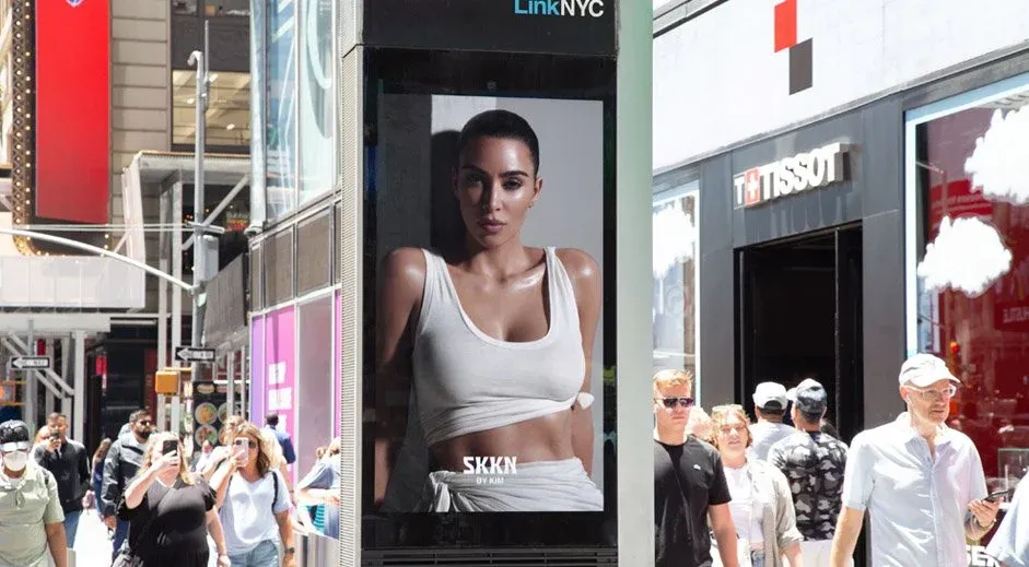 SKKN by Kim creative on a LinkNYC digital street kiosk in New York.