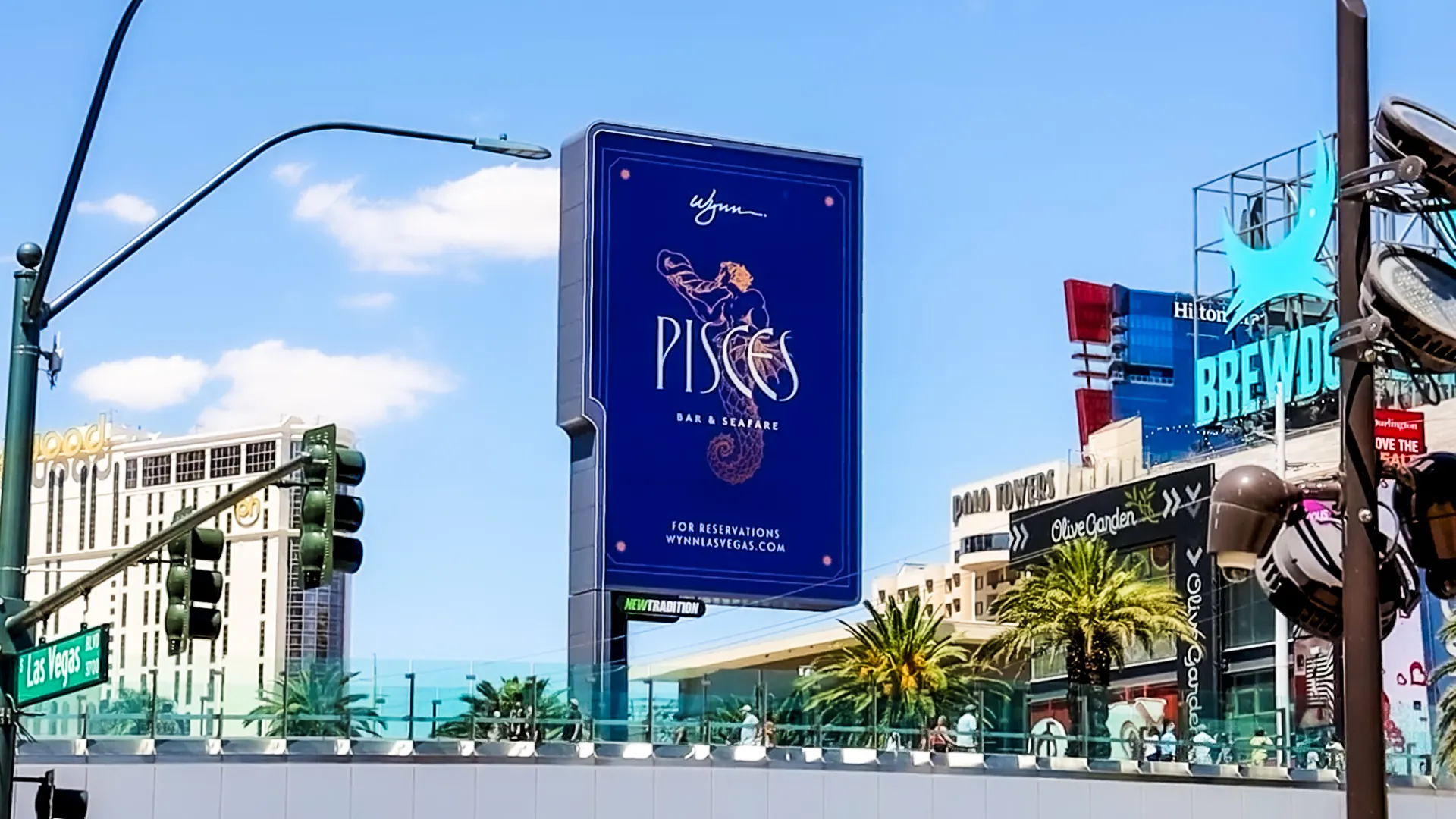 Wynn Pisces Bar & Seafood creative on a vertical video spectacular above Las Vegas Boulevard.