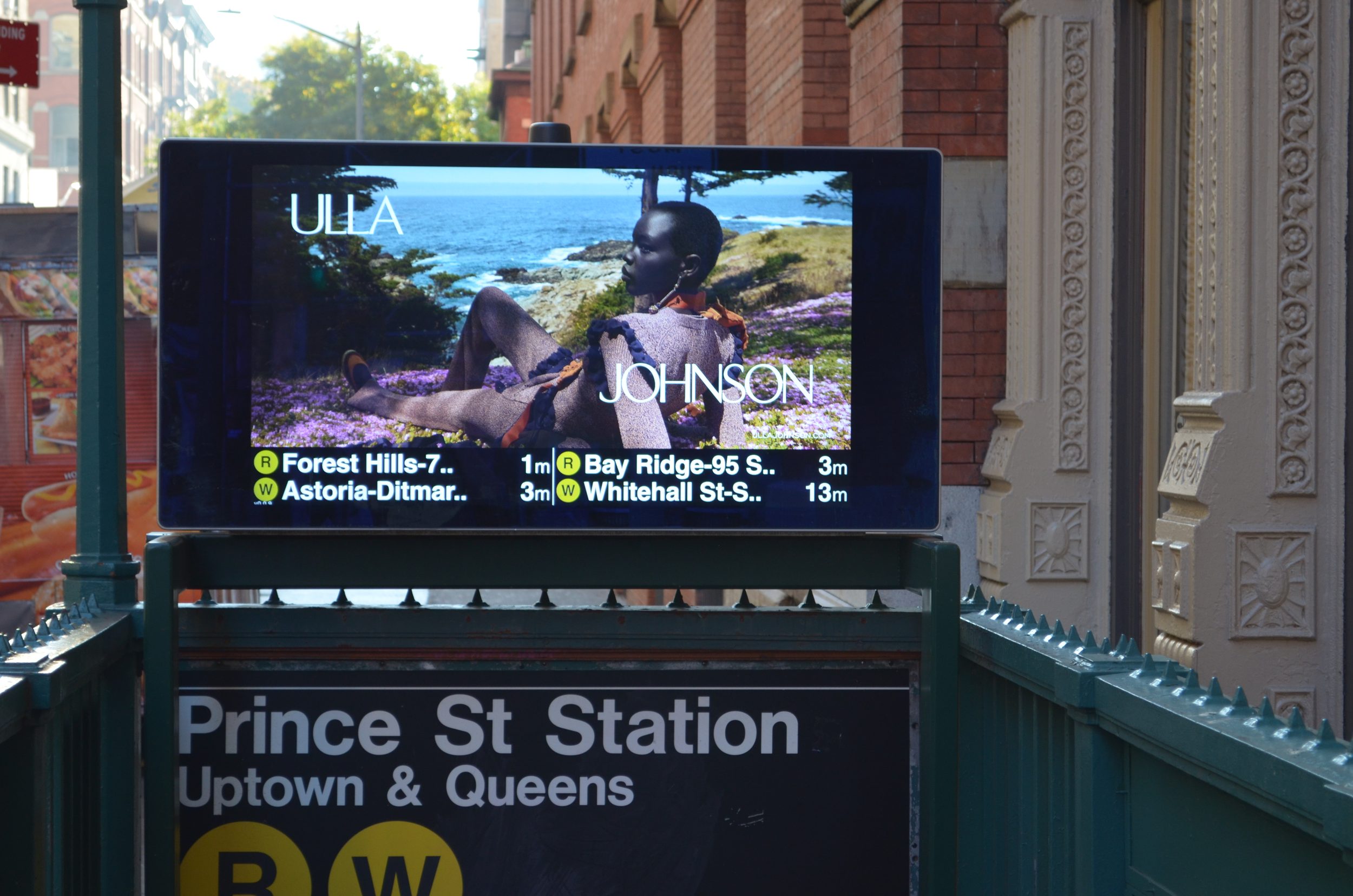Ulla Johnson creative on an urban panel along Prince Street, New York.