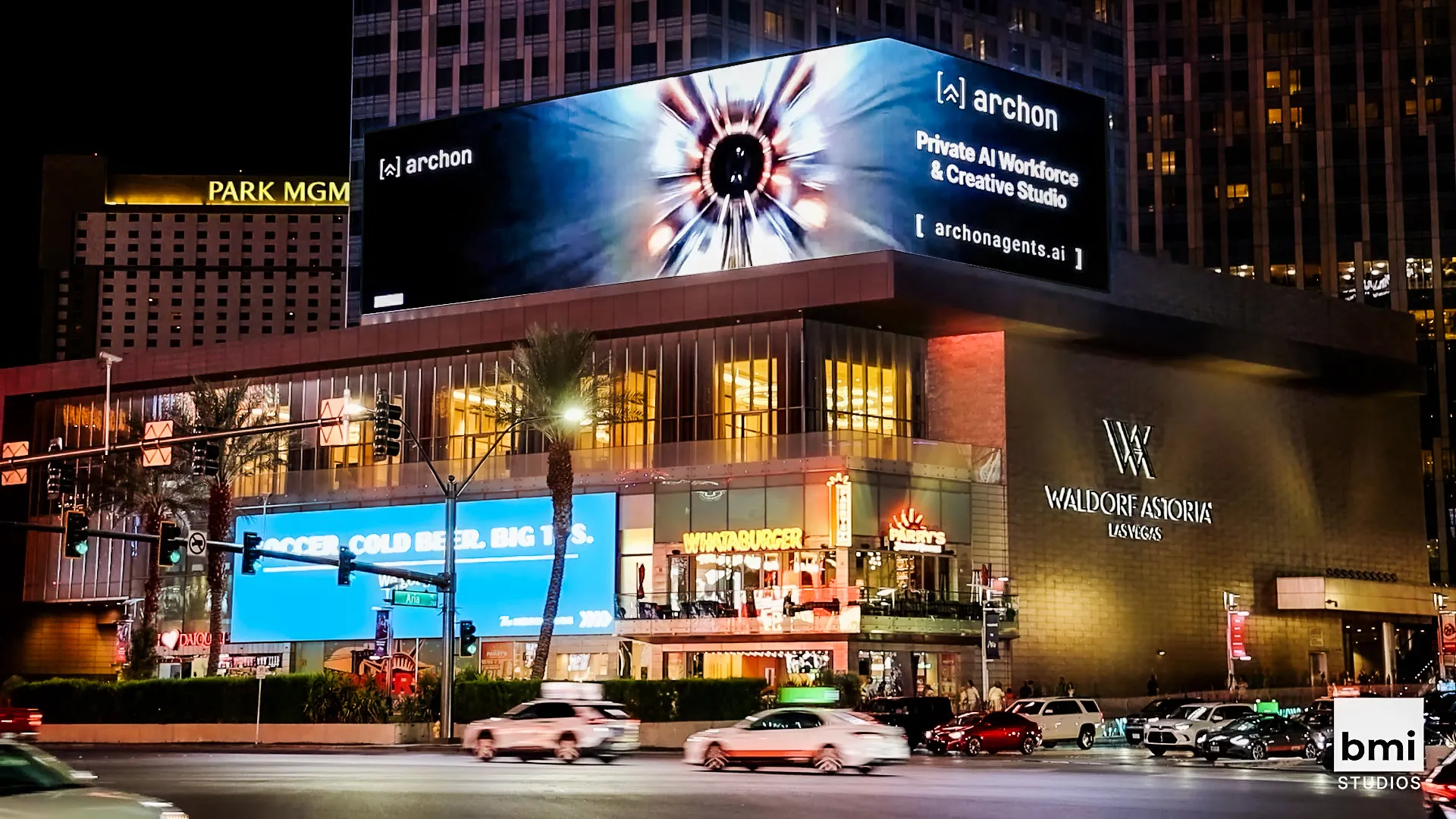 Archon AI workforce creative on the large digital display above the Waldorf Astoria, Las Vegas, at night.