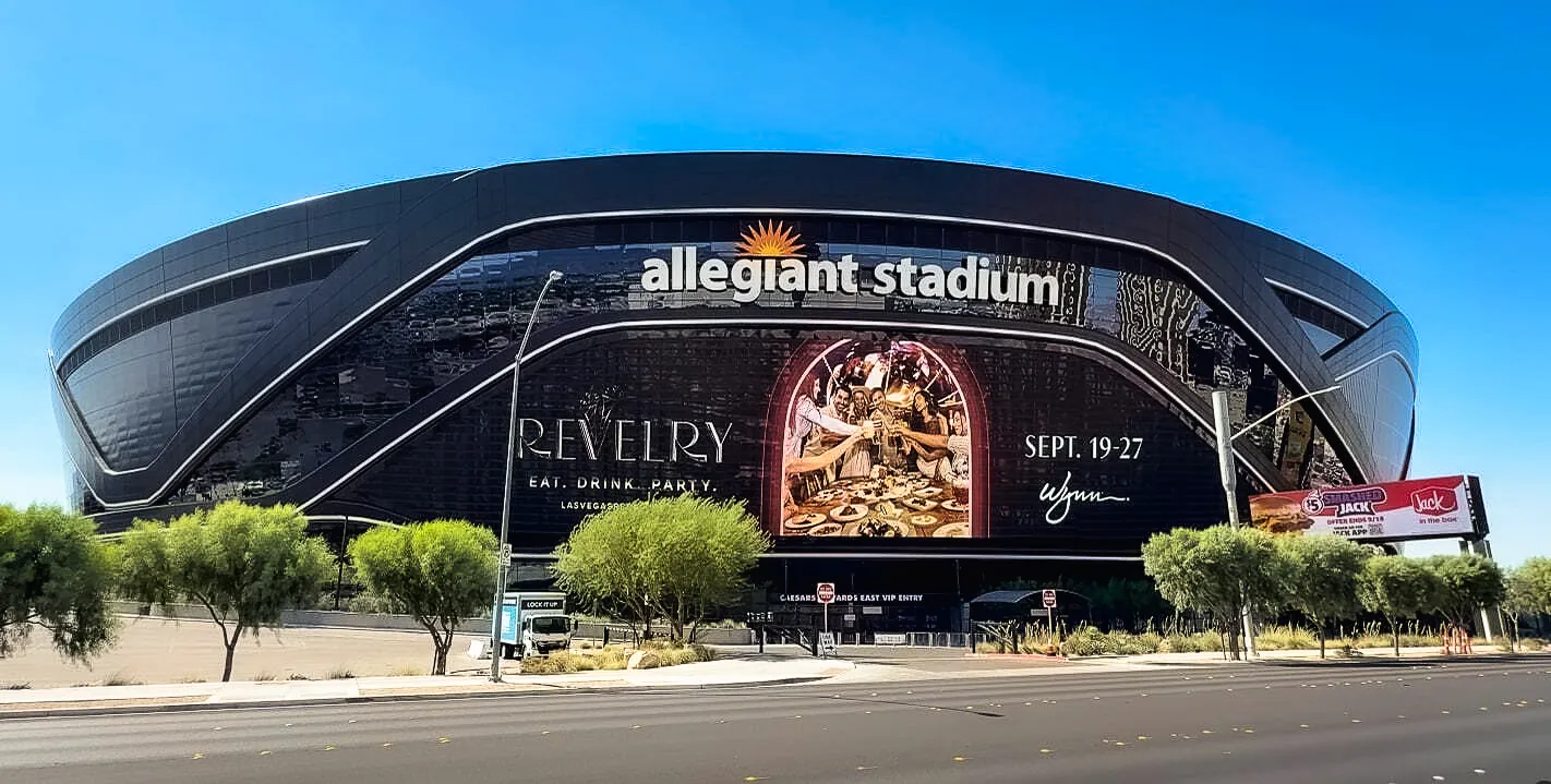 Revelry creative for Wynn Las Vegas on the LED mesh facade of Allegiant Stadium, Las Vegas.